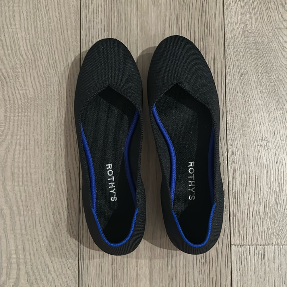 Black Rothy flats in great condition.